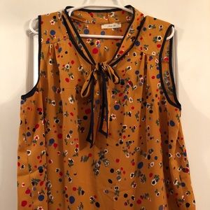 Mustard colored blouse